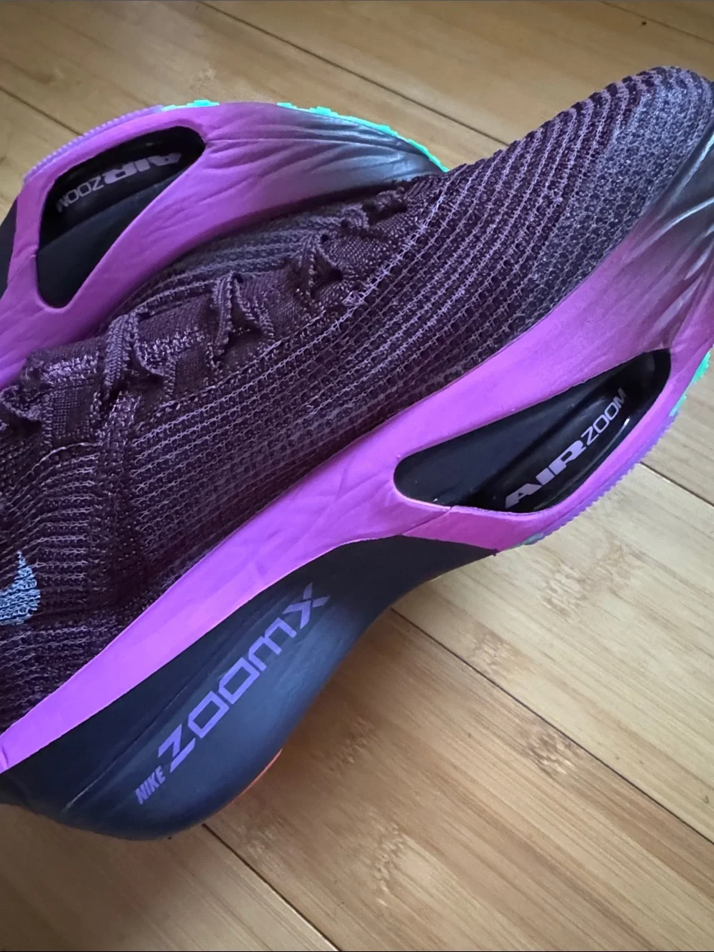 Nike Women’s Flyknit Trainers — Plum with Pink Accents